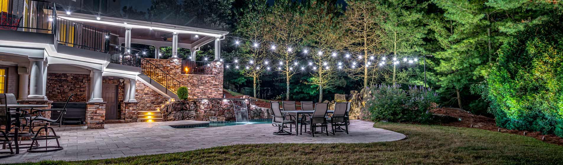 White Lighting over pool and backyard