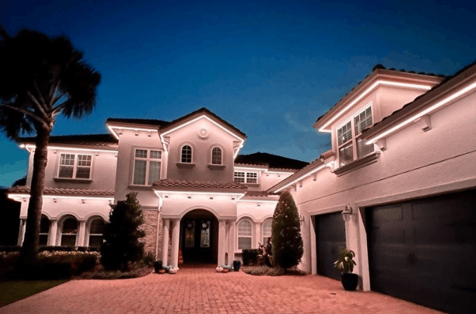 Luxurious house with Haven Evolution illuminated exterior at night