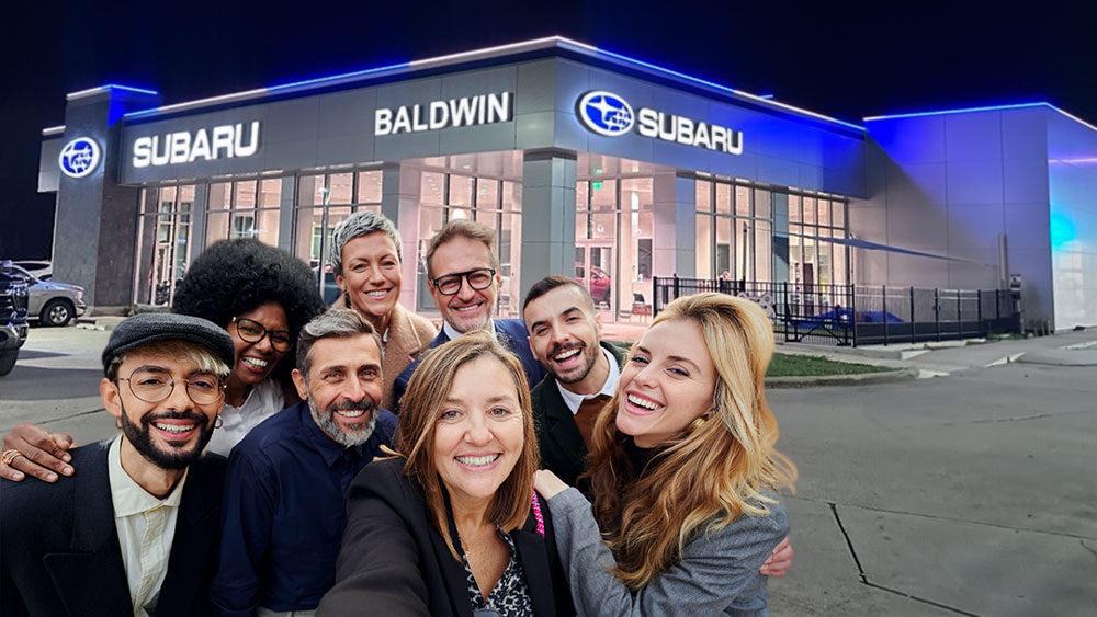 People in front of an Automotive Dealership