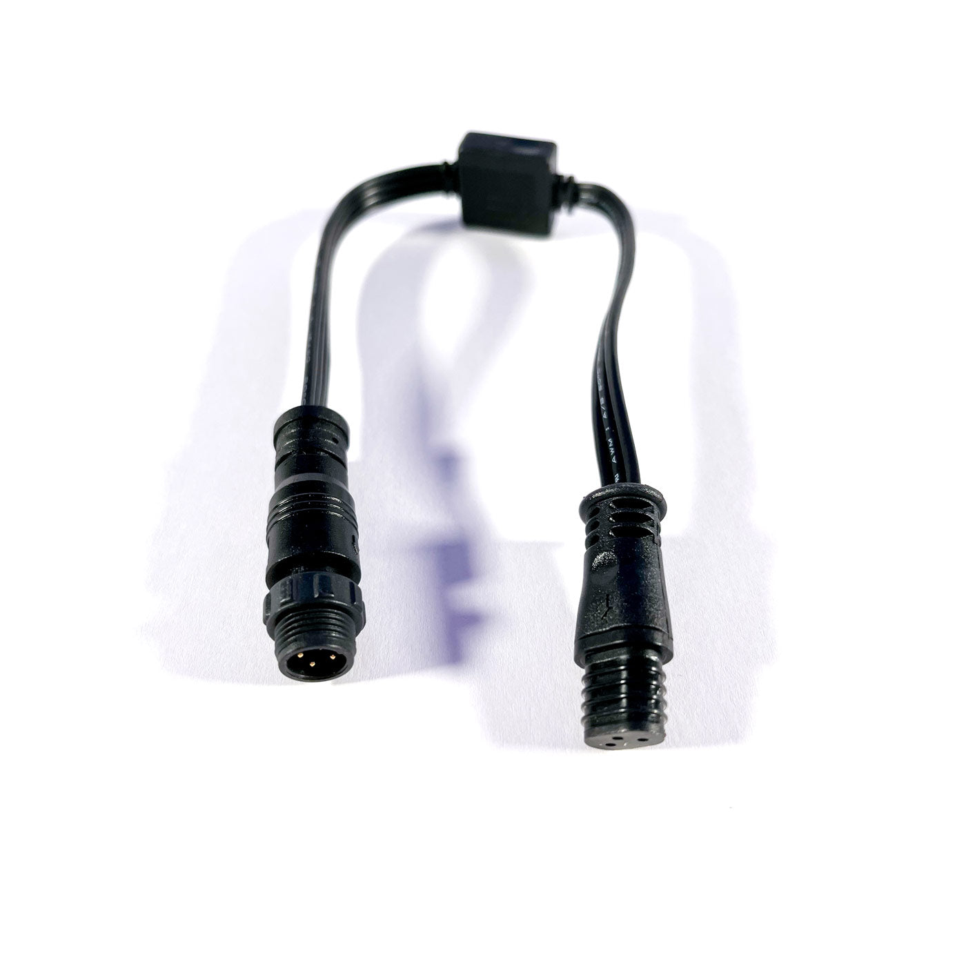 Black electrical connector on a white background
